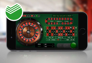 Смартфон и логотип Сбербанка